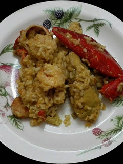 Una foto de Arroz con bogavante y pollo