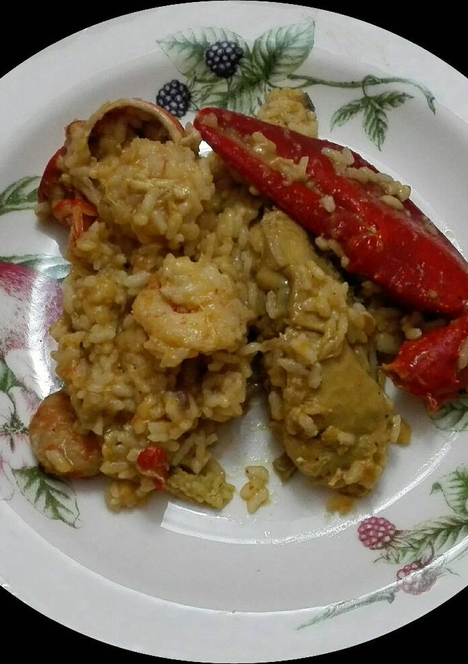 Una foto de Arroz con bogavante y pollo