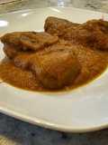 Contramuslos de pollo en salsa de berenjena, calabaza y curry