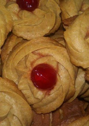 A picture of Cherry Topped Cookies.