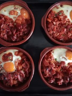 Una foto de Huevos a la flamenca