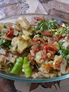 A picture of Dum Aloo Tomato.