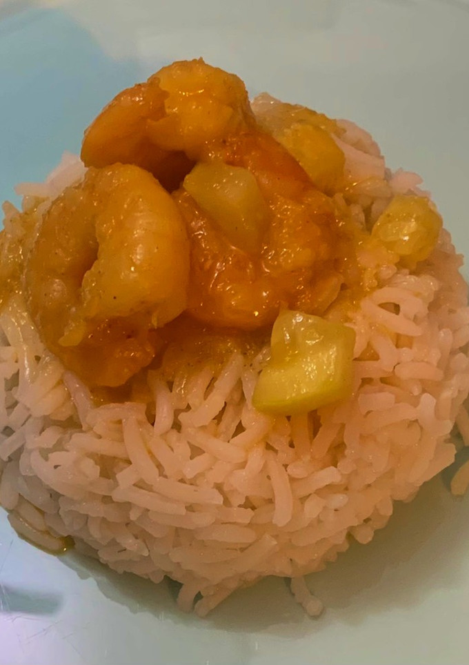 Una foto de Curry de langostinos