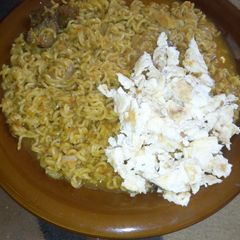 A picture of Noodles n scrambled eggs.