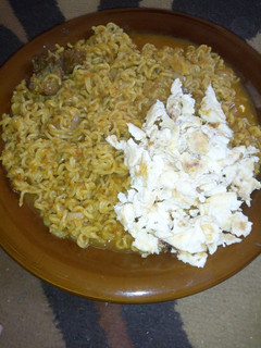 A picture of Noodles n scrambled eggs.
