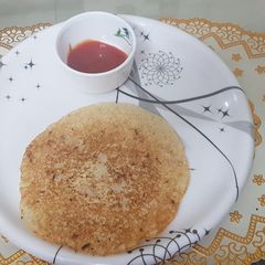 A picture of Sooji onion uttapam.