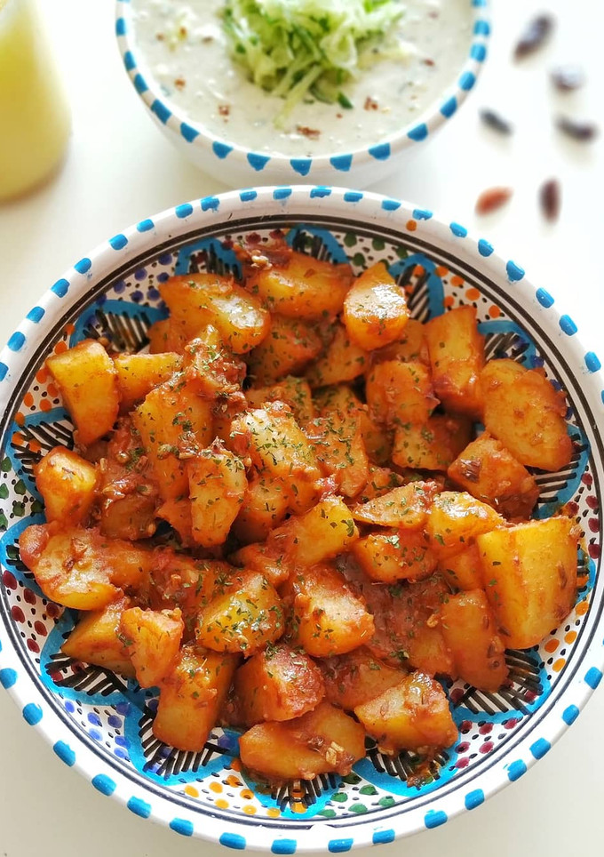 Una foto de Jeera aloo (plato indio vegano)
