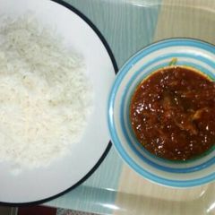 A picture of Rice with local stew.