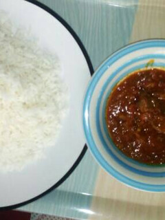 A picture of Rice with local stew.