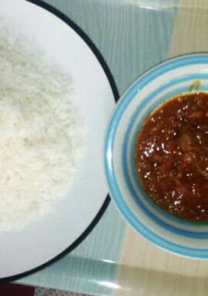 A picture of Rice with local stew.