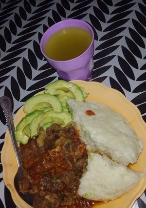 A picture of Ugali and meat.