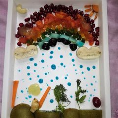 Rainbow fruit salad with honey A picture of Rainbow fruit salad with honey.