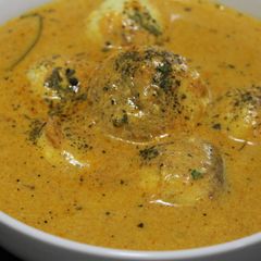 A picture of Paneer Malai Kofta (cheese balls in spicy creamy gravy).