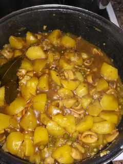 Una foto de Patatas estofadas con calamar