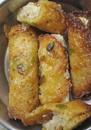 A picture of Malpuha with a small twist of Stuffed Rabadi.