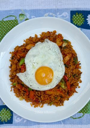 A picture of Chicken tikka fried rice.