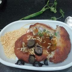 A picture of Poha Kachori Chaat.