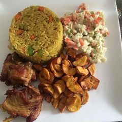 Fried rice with chicken and plantain A picture of Fried rice with chicken and plantain.