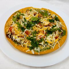 A picture of Cheesy Masala Chat Khakhra.
