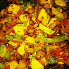 A picture of Special onion potato Karela(bitter gourd) sabji.