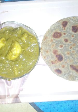 A picture of Aloo palak veggie with bajra ki roti---.