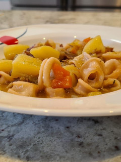 Una foto de Chipirones guisados con zanahorias, calabacín y patatas