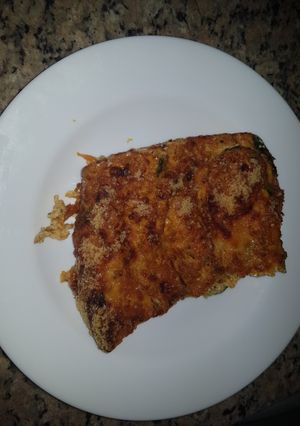 Una foto de Zapallo italiano gratinado..
