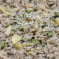 A picture of Alu matar wale rice.