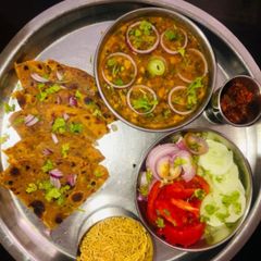 A picture of Sai bhaji with koki.