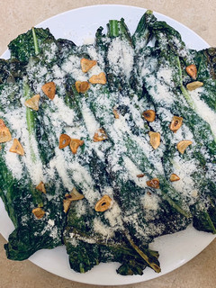 Una foto de Cavolo nero con parmesano y limón