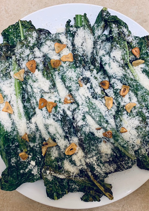 Una foto de Cavolo nero con parmesano y limón
