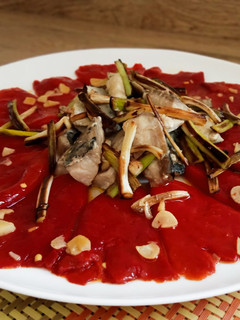 Una foto de Salteado de caballa con pimientos de piquillo