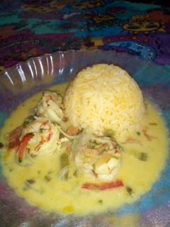 Una foto de Encocado de langostino