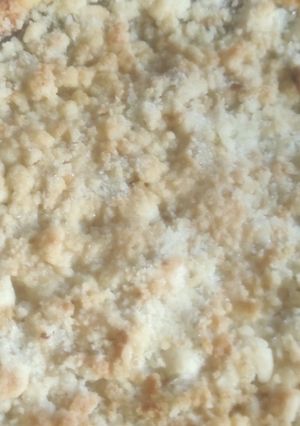 Una foto de Tarta de dulce de leche, coco y  crumble