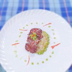 A picture of GRILLED FLANK STEAK with green chilli sauce & nutty cheese sauce.