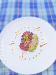 A picture of GRILLED FLANK STEAK with green chilli sauce & nutty cheese sauce.