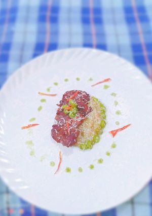 A picture of GRILLED FLANK STEAK with green chilli sauce & nutty cheese sauce.