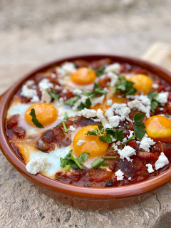 Una foto de Shakshuka - Pisto de verduras con especias y huevo