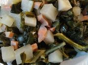 A picture of collard greens with ham