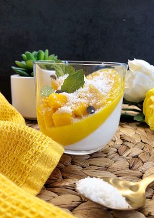 A picture of Coconut Panna Cotta with Mango.