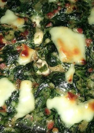 Foto principal de Contramuslos de pollo con bechamel de espinacas y jamón serrano