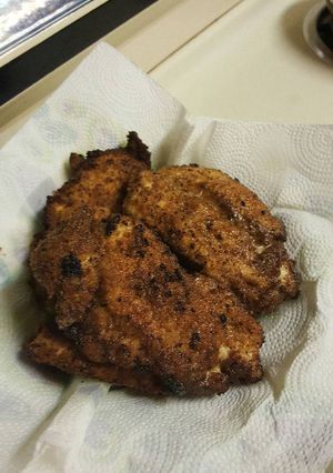 Una foto de Milanesa de pollo empanizada