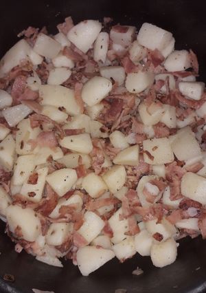 Una foto de Papas con tocino