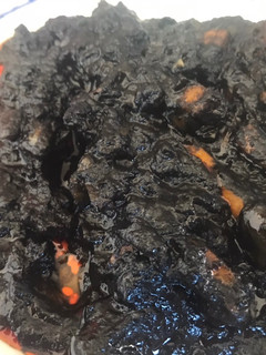 Una foto de Calamares en su tinta