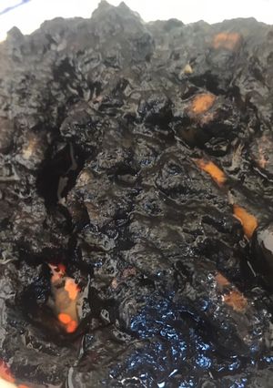 Una foto de Calamares en su tinta