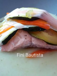 Una foto de Salmón en papillote en crema de apio