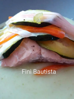 Una foto de Salmón en papillote en crema de apio