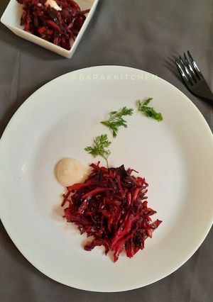 A picture of Wilted red velvet salad served with coconut cream.