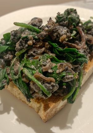 A picture of Mushroom, spinach and chestnuts on toast.