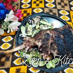 A picture of Charcoal Grilled Lamb Leg or Raan.